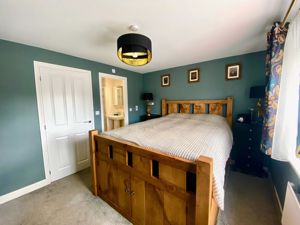 Bedroom One- click for photo gallery